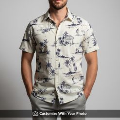 Man in classic navy and white Hawaiian shirt featuring palm trees and huts design