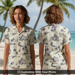 Woman in vintage Hawaiian shirt with navy palm trees and tropical coastal scene design