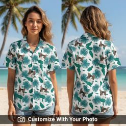 Woman wearing festive Christmas aloha shirt with cat face and green palm leaves