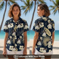Woman wearing black cat Hawaiian shirt with tropical leaves and hibiscus flowers