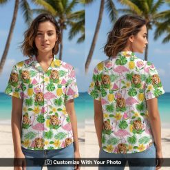 Woman wearing bold lion and flamingo print Hawaiian shirt with tropical leaves
