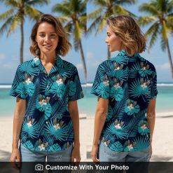 Woman wearing custom cat Hawaiian shirt with teal palm leaves and dark blue background