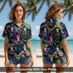 Woman wearing a cow print Hawaiian shirt with tropical flowers and bright colors