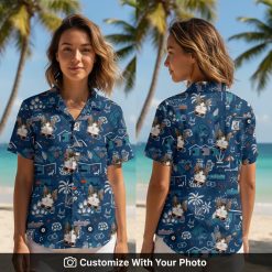 Woman wearing blue Christmas Hawaiian shirt with cat, palm trees, and geometric patterns