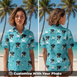 Woman wearing custom dog Hawaiian shirt with teal blue, swans, and black dog face print