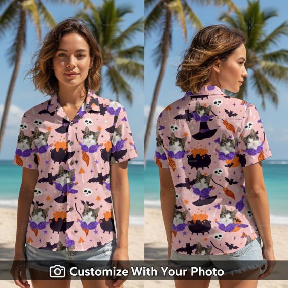 Woman in pink Halloween cat face Hawaiian shirt with pumpkins and witch hats
