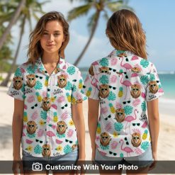 Woman in Lion King Hawaiian shirt with pink, teal, and yellow tropical summer print