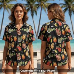 Woman wearing tropical cocktail print Hawaiian shirt with citrus fruits and mint details