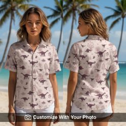 Woman wearing a tropical dinosaur aloha shirt with pink background and purple silhouettes