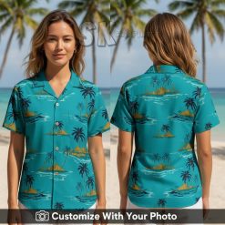 Woman wearing teal and yellow tropical Hawaiian shirt with palm tree and beach scene