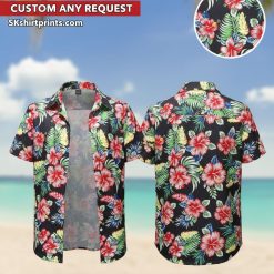 Woman wearing colorful tropical Hawaiian shirt with palm leaf print, relaxed beach vacation setting