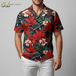 Close-up detail of red aloha shirt showing intricate hibiscus flower pattern and tropical leaf design