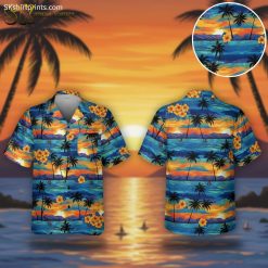 Beach Hawaii shirt with vibrant sunset scene featuring palm trees and sailboats in tropical colors