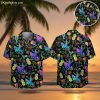Black aloha shirt with vibrant neon tropical pattern featuring cocktails, pineapples, and palm trees