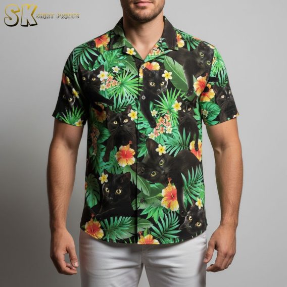 Black cat Hawaiian shirt with tropical monstera leaves and colorful plumeria flowers