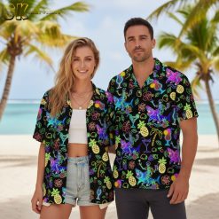 Black Hawaiian shirt with neon tropical print featuring flamingos, sharks, and tropical drinks