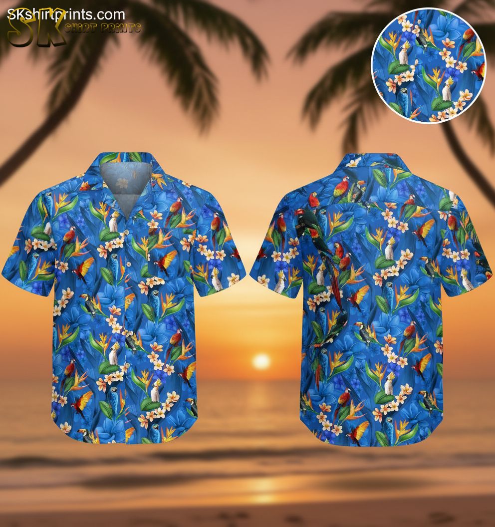 Blue aloha shirt featuring colorful parrots, toucans, and tropical flowers including orange bird-of-paradise and white plumeria