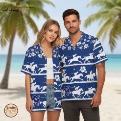 Blue and white hawaiian shirt with contrasting colors showing horse riders and hibiscus in alternating stripe layout