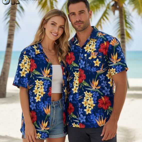 Blue floral Hawaiian shirt with red hibiscus, yellow plumeria, and orange tropical flowers on navy background
