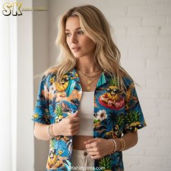 Blue floral Hawaiian shirt with tropical flowers and pineapple motifs