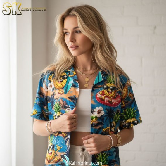 Blue floral Hawaiian shirt with tropical flowers and pineapple motifs
