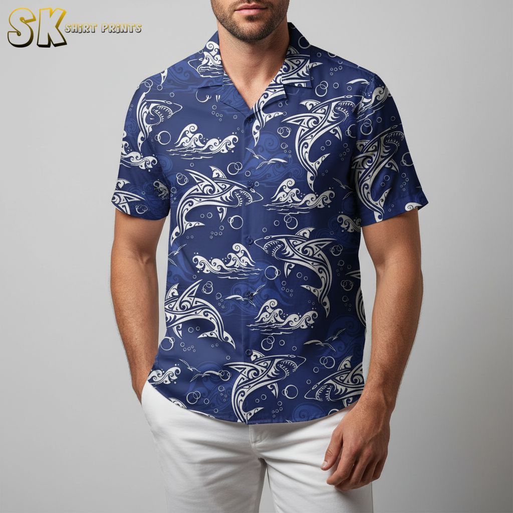 Blue Hawaiian shirt with white dolphin graphics and ocean wave artwork in tribal style patterns