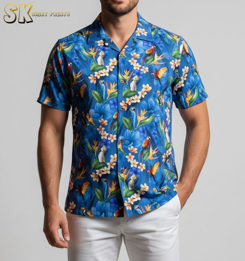 Blue hawaiian shirt displaying tropical parrots and toucans with colorful floral elements and green foliage