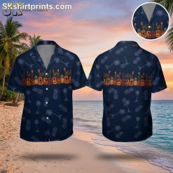 Blue hawaiian shirts for men featuring guitar, pineapple and palm tree pattern on dark background