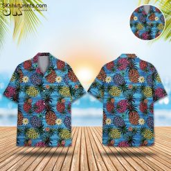 Blue pineapple Hawaiian shirt featuring colorful pineapples with leopard spots in orange, pink, yellow and purple