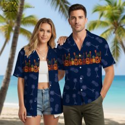Blue tropical shirt with pineapple and palm tree elements on contrasting background