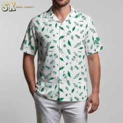 Blue and white Hawaiian shirt with tropical green leaf pattern design