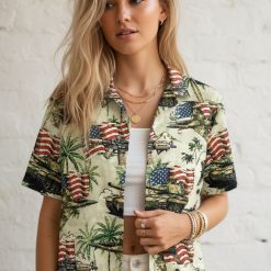 Custom military Hawaiian shirt featuring tanks, military aircraft and American flags with tropical styling