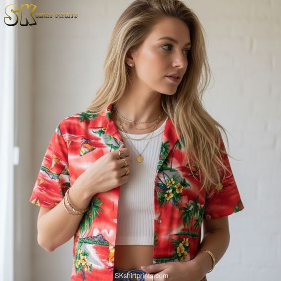 Dark red Hawaiian shirt worn casually, showing tropical print with palm trees and ocean scenes