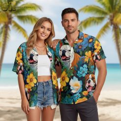 Dog hawaiian shirt displaying cartoon bulldogs with yellow and blue tropical flower arrangements