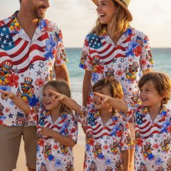 Duck button up shirt with cartoon ducks wearing bow ties and top hats surrounded by patriotic colored hibiscus flowers