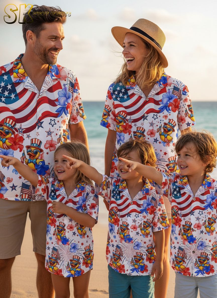Duck button up shirt with cartoon ducks wearing bow ties and top hats surrounded by patriotic colored hibiscus flowers