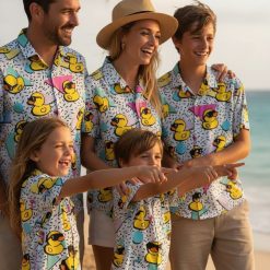 Duck hawaiian shirt displaying cartoon ducks wearing sunglasses on retro geometric background with pastel colors