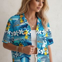 Duck hawaiian shirt with yellow duck pattern, large cruise ships, and tropical palm tree graphics