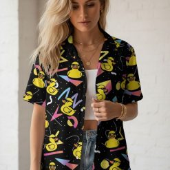 Duck print shirt showing rubber duck pattern mixed with bright triangular and circular shapes
