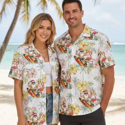 Family Christmas Hawaiian shirt displaying Santa on surfboard with tropical hibiscus flowers and pineapple patterns