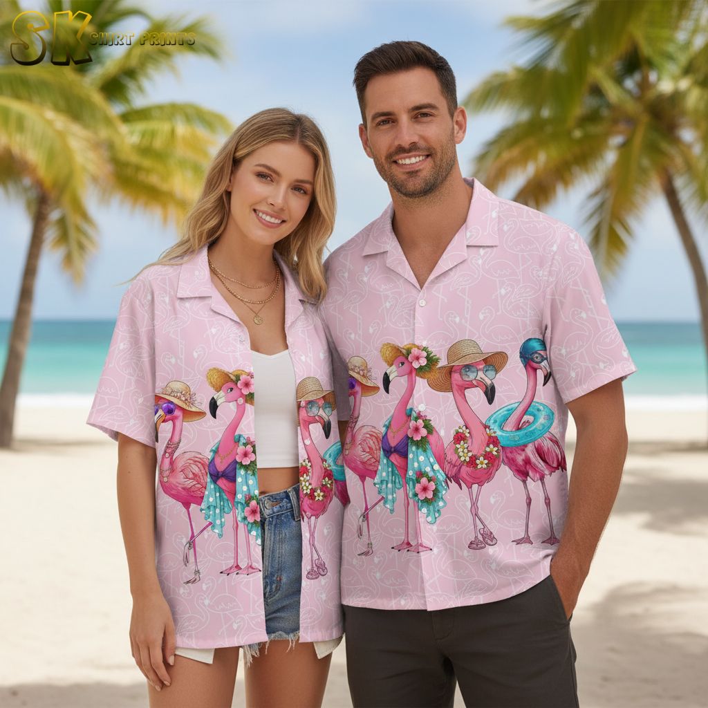 Flamingo aloha shirt showing four flamingos wearing tropical accessories like sunglasses and flower leis on pink fabric