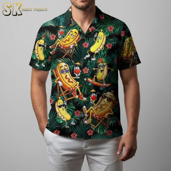 Green and black Hawaiian shirt displaying hot dog characters skateboarding with tropical elements