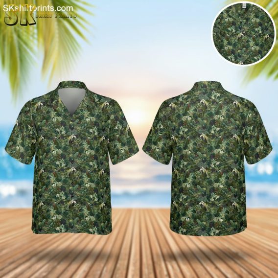 Green Hawaiian shirt womens featuring dense tropical leaf pattern with jungle foliage design