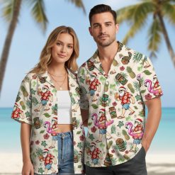 Hawaiian Christmas shirt for men showing flamingos, tiki masks, and hibiscus flowers with Santa elements