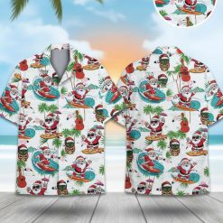 Hawaiian Christmas shirt for men featuring surfing Santa, palm trees, tiki masks and hibiscus flowers