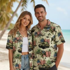 Hawaiian gun shirt with detailed firearm graphics mixed with palm trees and tropical elements