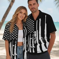 Hawaiian gun shirt displaying white firearm silhouettes on black background with star panel