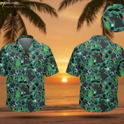 Hawaiian shirt dragon print featuring black cartoon dragons with large eyes and green foliage pattern