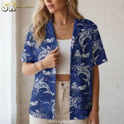 Men's blue Hawaiian shirt with white dolphin and swirling wave print featuring tribal-inspired artwork