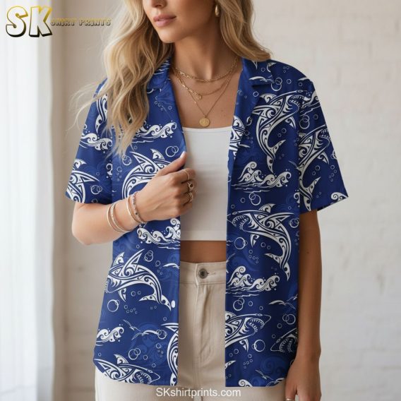 Men's blue Hawaiian shirt with white dolphin and swirling wave print featuring tribal-inspired artwork
